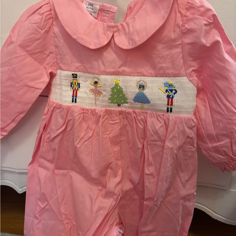 Pink Smocked Baby Romper with Nutcracker Embroidery